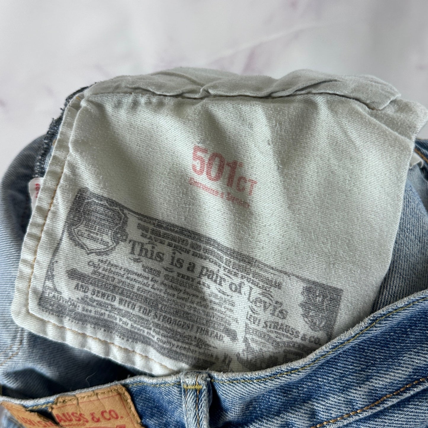 Levi's 501 Light Wash Distressed Denim Jeans