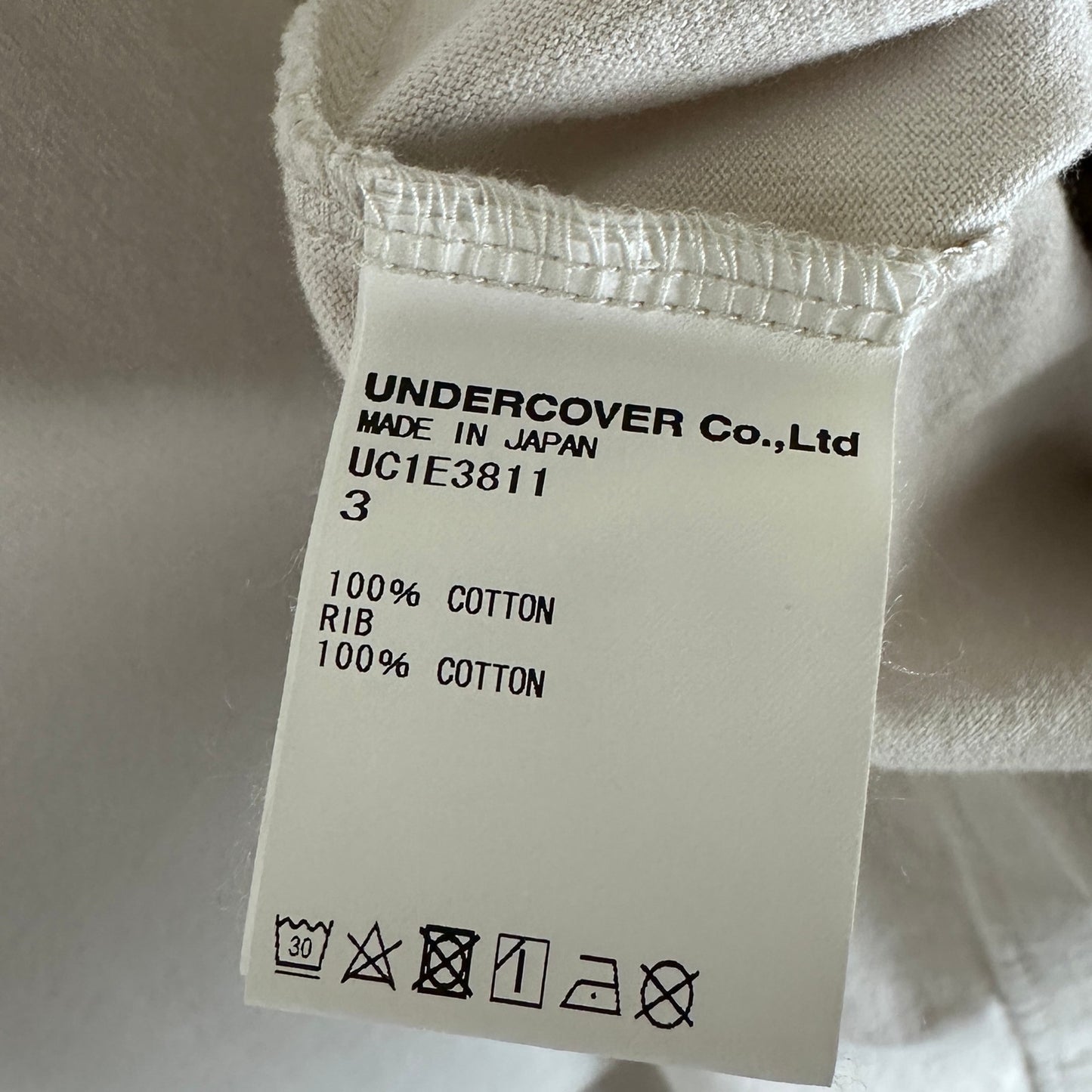 Undercover Robert Bosisio S/S25 White Patch Portrait Tee