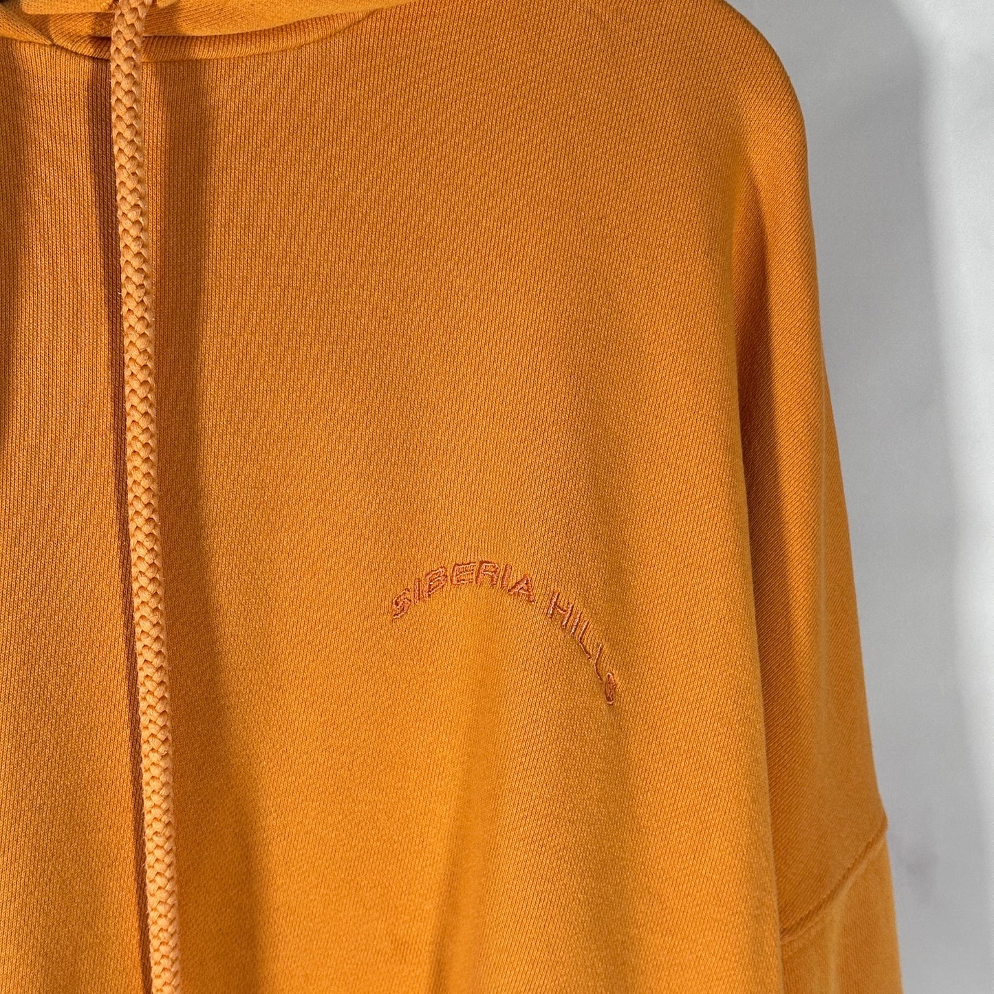 Siberia Hills Orange Arc Logo Hoodie
