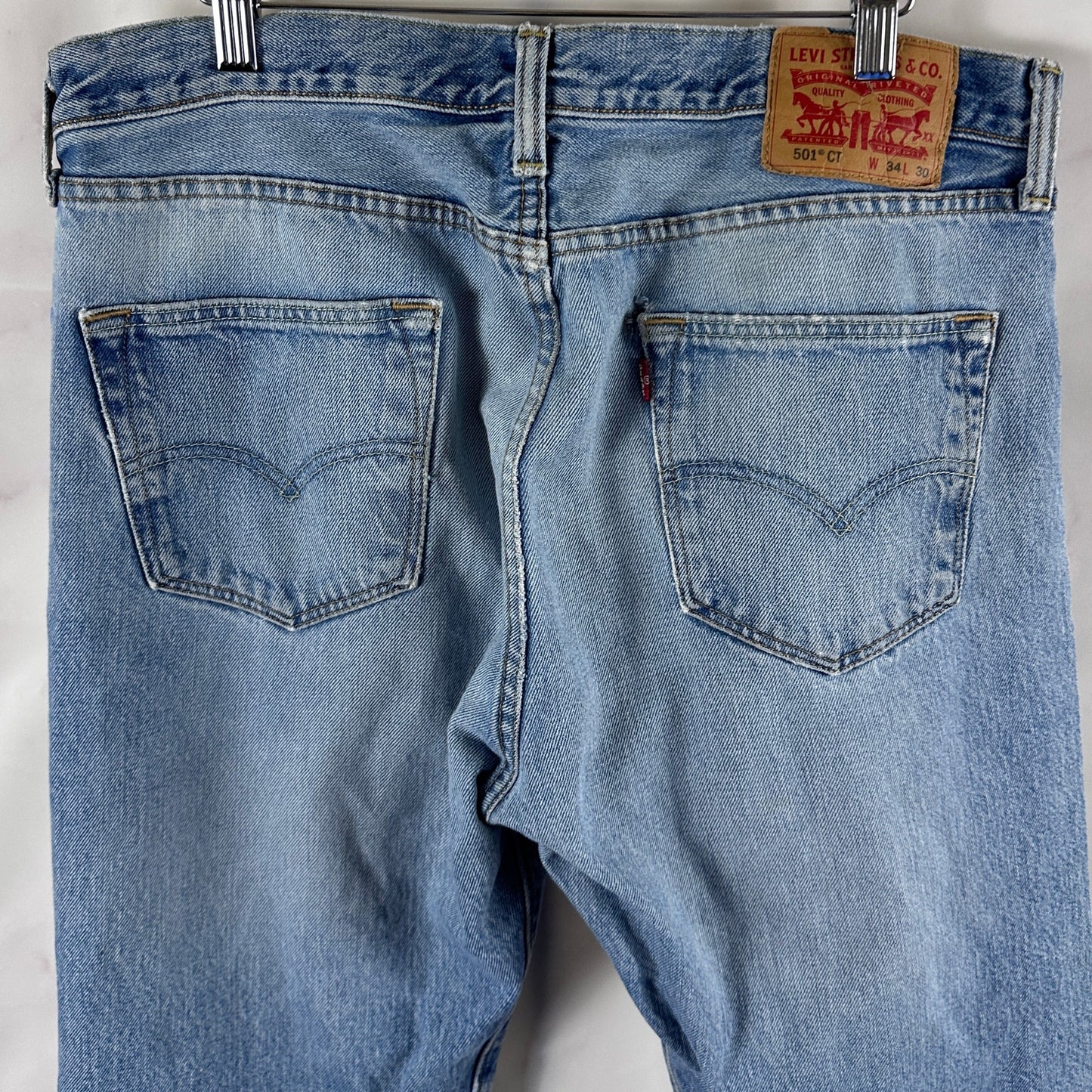 Levi's 501 Light Wash Distressed Denim Jeans